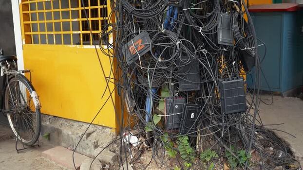 View of tangled electrical wires in Dhaka Bangladesh.