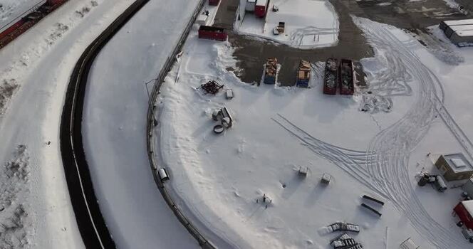 Aerial view of a snow covered industrial yard in Reading United States. Aerial view of a snow covered industrial yard in Reading United States.