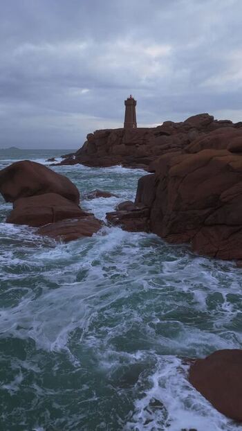 Aerial view of Phare de Men Ruz on the coast of France.