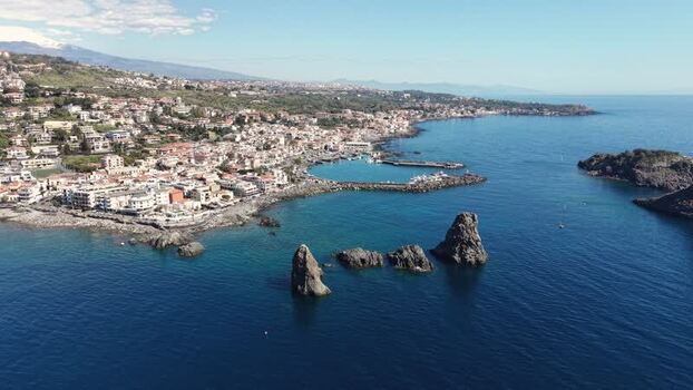 Aerial view of Islands of the Cyclops and Aci Castello Italy.