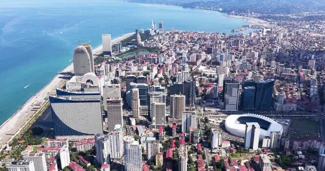 Aerial view of Batumi coastline and modern city skyline Georgia. Aerial view of Batumi coastline and modern city skyline Georgia.