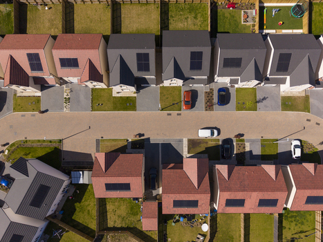 Linlithgow United Kingdom 29 April 2026 Aerial view of modern residential houses with solar panels on roofs and parked cars along a paved street. Linlithgow United Kingdom 29 April 2026 Aerial view of modern residential houses with solar panels on roofs and parked cars along a paved street.