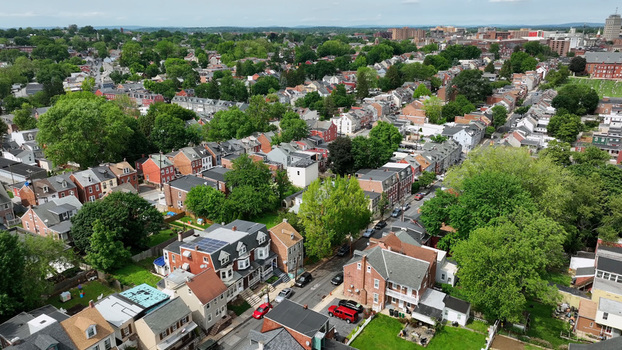 Aerial view of the residential neighborhood of South Lancaster with dense housing tree lined streets and historic brick buildings in Lancaster Pennsylvania United States. Aerial view of the residential neighborhood of South Lancaster with dense housing tree lined streets and historic brick buildings in Lancaster Pennsylvania United States.