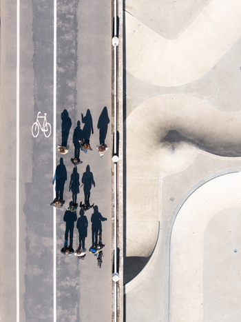 Aerial view of people walking along a path next to a skatepark in Chiune Sugihara Sakura Park in Vilnius Vilniaus apskritis Lithuania. Aerial view of people walking along a path next to a skatepark in Chiune Sugihara Sakura Park in Vilnius Vilniaus apskritis Lithuania.