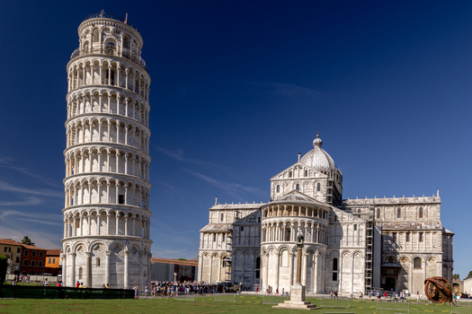 View of the Leaning Tower of Pisa and the Pisa Cathedral under a clear blue sky in Pisa Toscana Italy. View of the Leaning Tower of Pisa and the Pisa Cathedral under a clear blue sky in Pisa Toscana Italy.