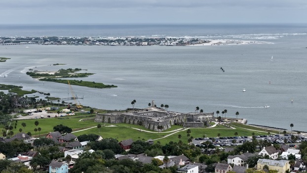 Aerial view of Castillo de San Marcos National Monument with green lawns and palm trees overlooking the Matanzas River and historic St. Augustine St. Augustine Florida United States. Aerial view of Castillo de San Marcos National Monument with green lawns and palm trees overlooking the Matanzas River and historic St. Augustine St. Augustine Florida United States.