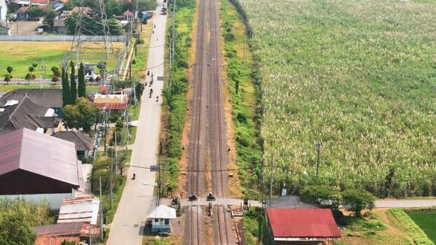Aerial view of railway tracks and fields in Pekalongan Indonesia. Aerial view of railway tracks and fields in Pekalongan Indonesia.