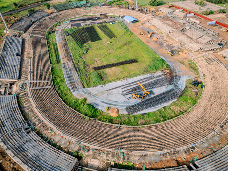 Aerial view of Ahmadu Bello Stadium in Kaduna showing ongoing construction work on the concrete seating tiers and the central field area in Kaduna Kaduna Nigeria. Aerial view of Ahmadu Bello Stadium in Kaduna showing ongoing construction work on the concrete seating tiers and the central field area in Kaduna Kaduna Nigeria.