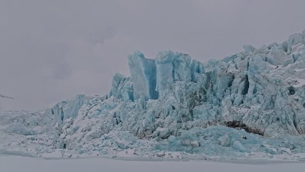 Aerial view of blue glacier ice formations Svalbard and Jan Mayen.