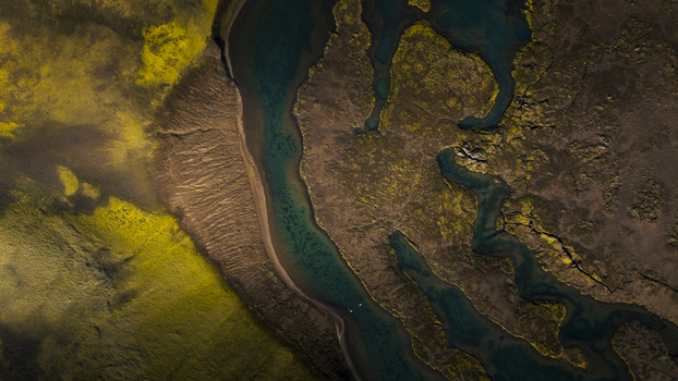 Aerial view of Langisjor lake with vibrant green moss and dark volcanic terrain in Vik Myrdalshreppur Iceland. Aerial view of Langisjor lake with vibrant green moss and dark volcanic terrain in Vik Myrdalshreppur Iceland.
