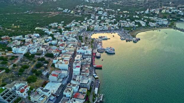 Aerial view of Crete coastal town and harbor Greece.