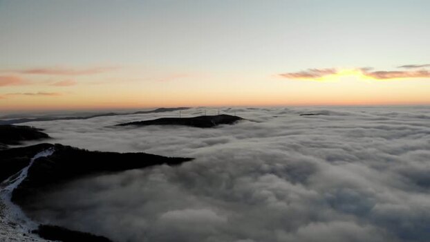 Aerial view of Balkan Mountains above clouds in Lovech Bulgaria.
