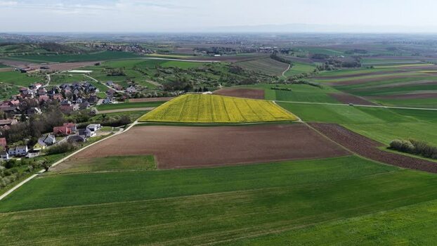 Aerial view of farmlands and village France.