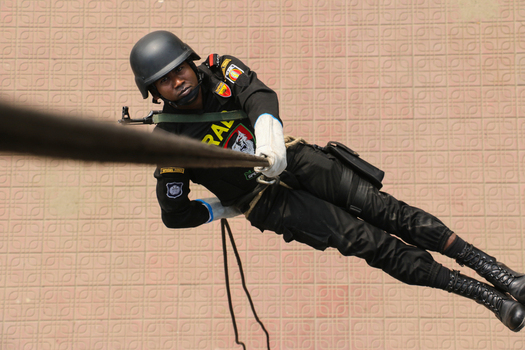 Dhaka Bangladesh 06 January 2017 View of a Rapid Action Battalion officer rappelling down a wall during a training exercise at the RAB Headquarters. Dhaka Bangladesh 06 January 2017 View of a Rapid Action Battalion officer rappelling down a wall during a training exercise at the RAB Headquarters.