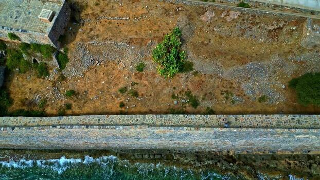Aerial view of stone fortifications in Crete Greece.