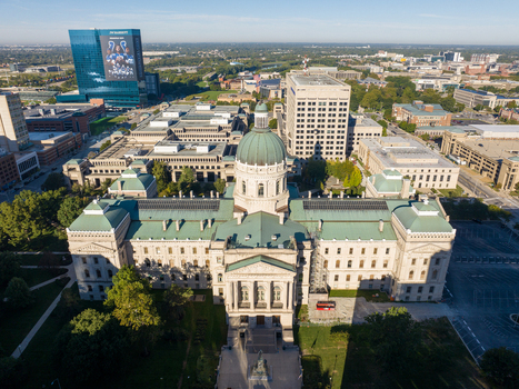 Indianapolis Indiana United States 27 September 2026 Aerial view of the Indiana State Capitol with its dome surrounded by urban architecture green lawns and city streets. Indianapolis Indiana United States 27 September 2026 Aerial view of the Indiana State Capitol with its dome surrounded by urban architecture green lawns and city streets.