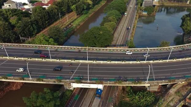 Aerial view of a highway overpass with traffic in Jakarta Indonesia.
