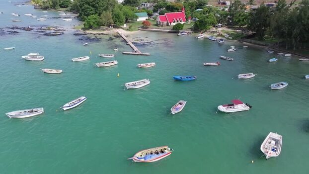 Aerial view of Cap Malheureux church and boats Mauritius.