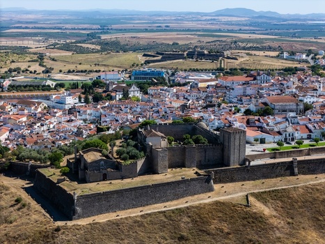 Aerial view of the historic Elvas Castle and the surrounding town with white washed buildings and red tiled roofs in Elvas Portalegre Portugal. Aerial view of the historic Elvas Castle and the surrounding town with white washed buildings and red tiled roofs in Elvas Portalegre Portugal.