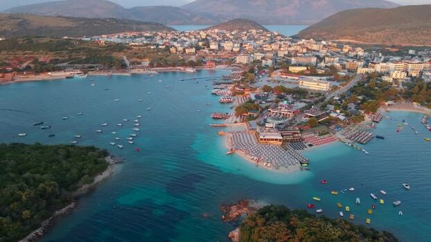 Aerial view of Ksamil coastal town and turquoise waters Albania.