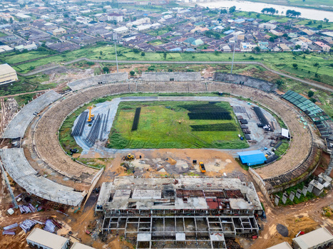 Aerial view of Ahmadu Bello Stadium under renovation with construction equipment and materials on the field in Kaduna Kaduna Nigeria. Aerial view of Ahmadu Bello Stadium under renovation with construction equipment and materials on the field in Kaduna Kaduna Nigeria.
