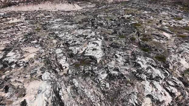 FPV aerial view of rocky terrain in Uummannaq Greenland. FPV aerial view of rocky terrain in Uummannaq Greenland.