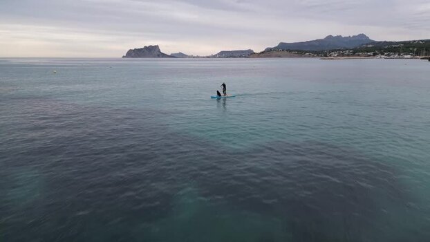 Aerial view of paddleboarding in the sea near Moraira Spain.