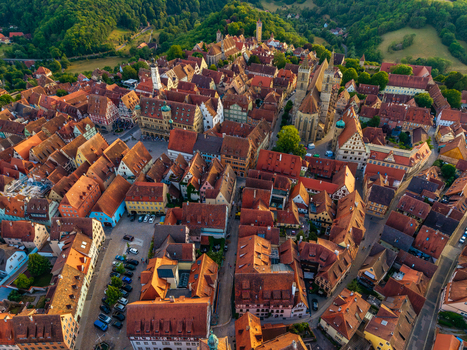 Aerial view of the historic town of Rothenburg ob der Tauber featuring timber framed houses with red tiled roofs and St. Jakob s Church Rothenburg ob der Tauber Bavaria Germany. Aerial view of the historic town of Rothenburg ob der Tauber featuring timber framed houses with red tiled roofs and St. Jakob s Church Rothenburg ob der Tauber Bavaria Germany.