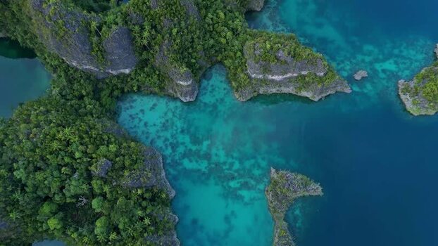 Aerial view of Piaynemo karst islands in Indonesia. Aerial view of Piaynemo karst islands in Indonesia.