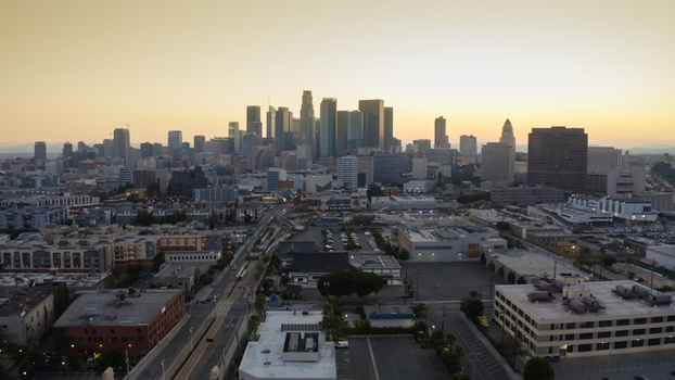 Aerial view of the Los Angeles skyline during golden hour with skyscrapers and urban sprawl in Los Angeles California United States. Aerial view of the Los Angeles skyline during golden hour with skyscrapers and urban sprawl in Los Angeles California United States.