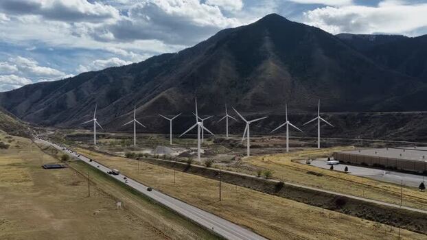 Aerial view of wind turbines near a road United States.