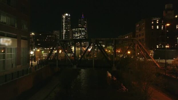 Aerial view of Denver skyline at night over the river United States.