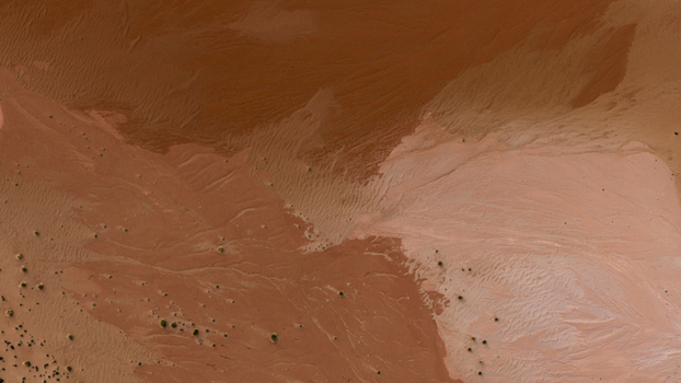 Aerial view of intricate sand patterns and desert textures across the arid landscape of Kalbarri Western Australia Australia. Aerial view of intricate sand patterns and desert textures across the arid landscape of Kalbarri Western Australia Australia.