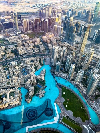 Aerial view of the Dubai Fountain and modern skyscrapers in Downtown Dubai Dubai Dubai United Arab Emirates. Aerial view of the Dubai Fountain and modern skyscrapers in Downtown Dubai Dubai Dubai United Arab Emirates.