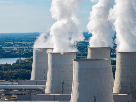 Aerial view of Janschwalde Power Station with cooling towers emitting steam over the surrounding landscape in Peitz Brandenburg Germany. Aerial view of Janschwalde Power Station with cooling towers emitting steam over the surrounding landscape in Peitz Brandenburg Germany.