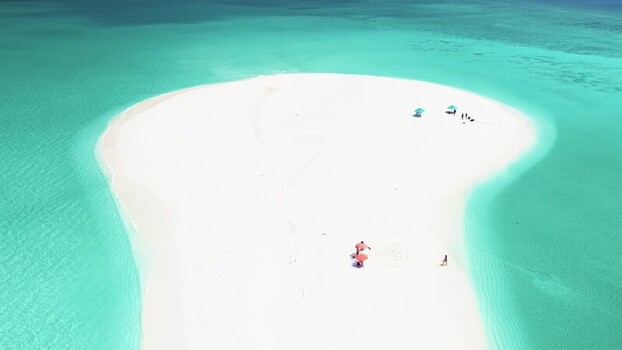 Aerial view of a white sandbank surrounded by turquoise water Maldives. Aerial view of a white sandbank surrounded by turquoise water Maldives.