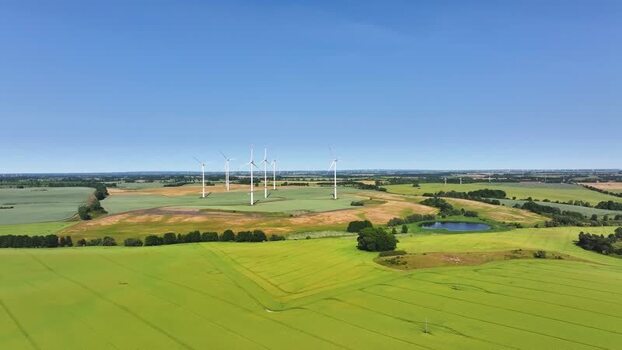 Aerial view of wind turbines in agricultural fields Germany.