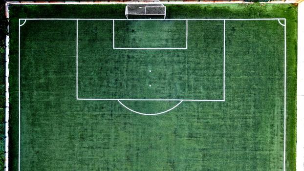 Aerial view of the soccer field at Brzece Sports Centar with artificial turf and white markings in Brzece Rasina District Serbia.