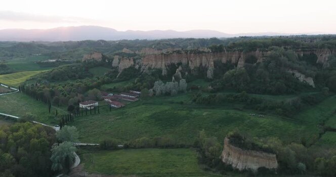 Aerial view of the Balze del Valdarno rock formations and green hills Italy. Aerial view of the Balze del Valdarno rock formations and green hills Italy.