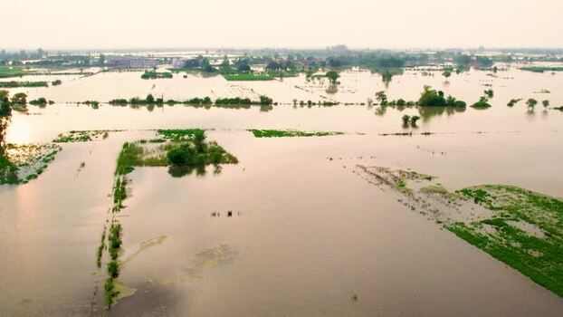 Aerial view of flooded village fields in India.