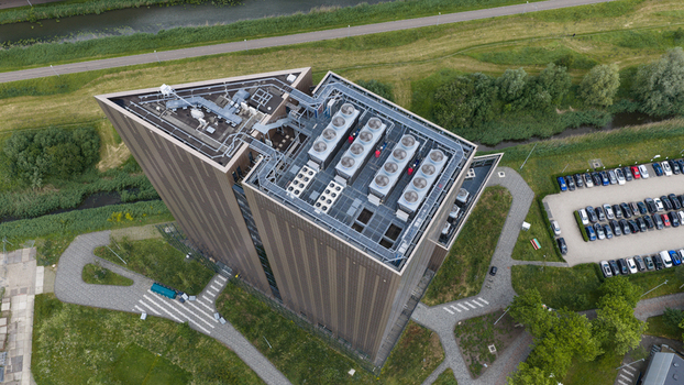 Amsterdam Noord Holland 09 June 2026 Aerial view of the Digital Realty Amsterdam AMS17 data center featuring its angular architecture rooftop cooling units and parking area. Amsterdam Noord Holland 09 June 2026 Aerial view of the Digital Realty Amsterdam AMS17 data center featuring its angular architecture rooftop cooling units and parking area.