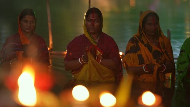 View of women performing a religious ritual in water Bangladesh. View of women performing a religious ritual in water Bangladesh.
