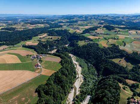 Aerial view of Sodbachbrucke Sense spanning the river valley surrounded by lush forests agricultural fields and rolling hills in Heitenried Freiburg Switzerland. Aerial view of Sodbachbrucke Sense spanning the river valley surrounded by lush forests agricultural fields and rolling hills in Heitenried Freiburg Switzerland.