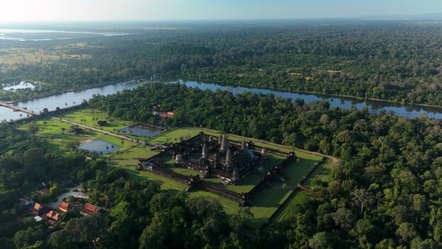 Aerial view of Angkor Wat temple complex in Cambodia. Aerial view of Angkor Wat temple complex in Cambodia.