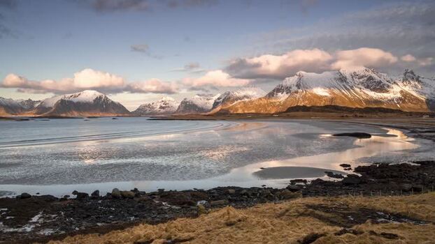 View of Lofoten mountains and bay Norway. View of Lofoten mountains and bay Norway.