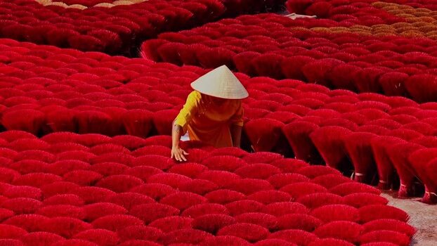 View of red incense sticks in Quang Phu Cau Vietnam.