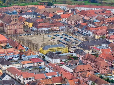 Aerial view of the Vauban designed fortress city unfolds in a tapestry of red tiled roofs and orderly streets Neuf Brisach Grand Est France.