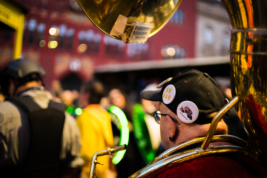 Basel Switzerland 10 March 2025 View of a tuba player in the vibrant bustling Fasnacht celebration brass gleaming under the soft glow of city lights. Basel Switzerland 10 March 2025 View of a tuba player in the vibrant bustling Fasnacht celebration brass gleaming under the soft glow of city lights.