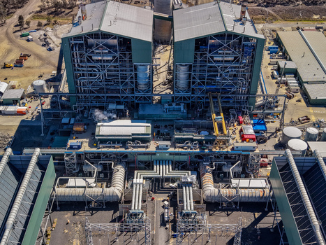 Aerial view of Millmerran Power Station showing industrial infrastructure large cooling towers complex piping systems and surrounding facility grounds in Domville Queensland Australia. Aerial view of Millmerran Power Station showing industrial infrastructure large cooling towers complex piping systems and surrounding facility grounds in Domville Queensland Australia.