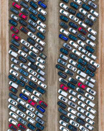 Aerial view of rows of parked vehicles at a car forwarding facility in Mszczonow Masovian Voivodeship Poland.